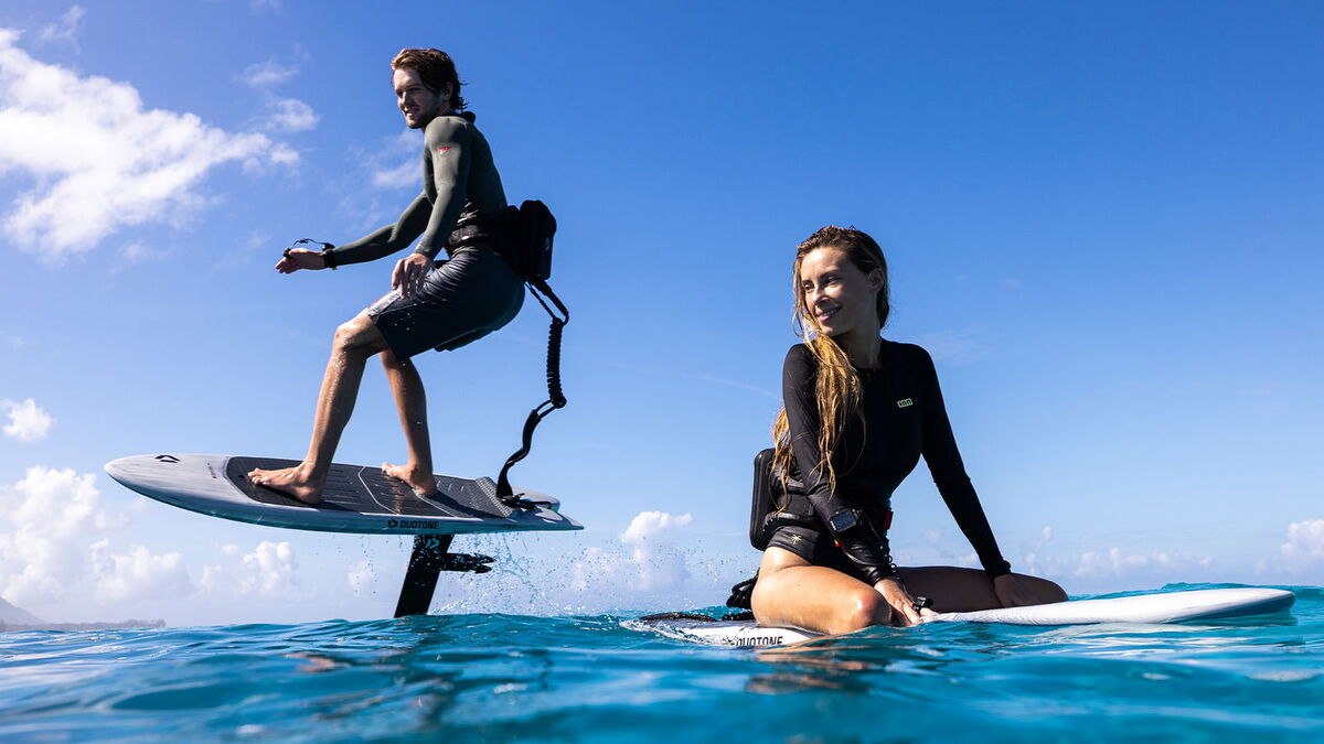 Two riders foiling with Duotone Foil Assist on Midfish boards in Tahiti